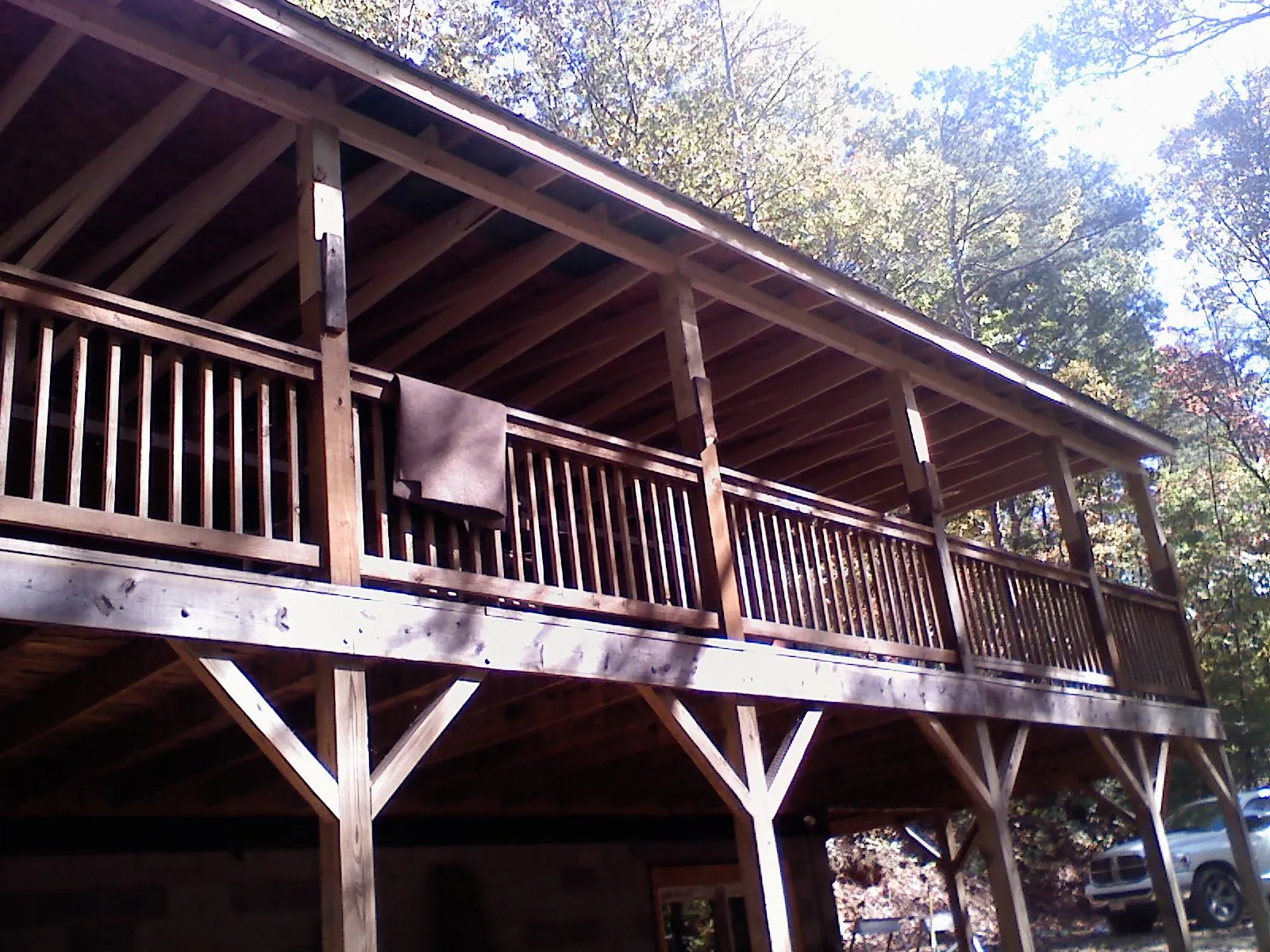 Timber framing under a new elevated porch and deck — Roof Leak Repair in Westville by Roofing Brothers